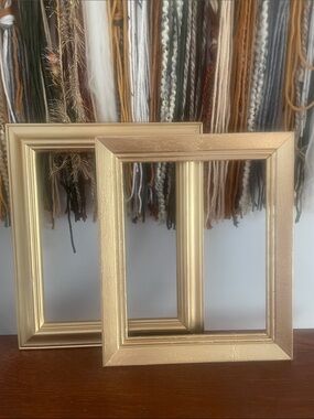 Set of 2 open wood frames gold color